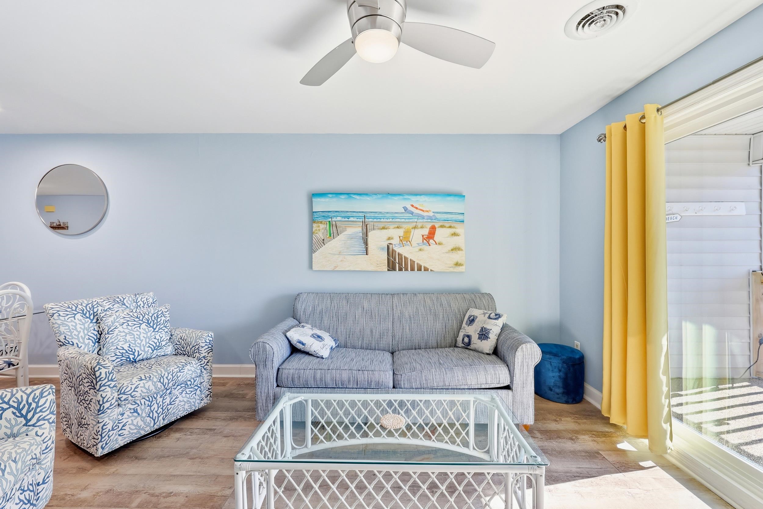 2001 Spring Street, Unit H2 North Myrtle Beach, SC 29582 - Photo 9 of 25 Living room featuring wood finished floors and a ceiling fan