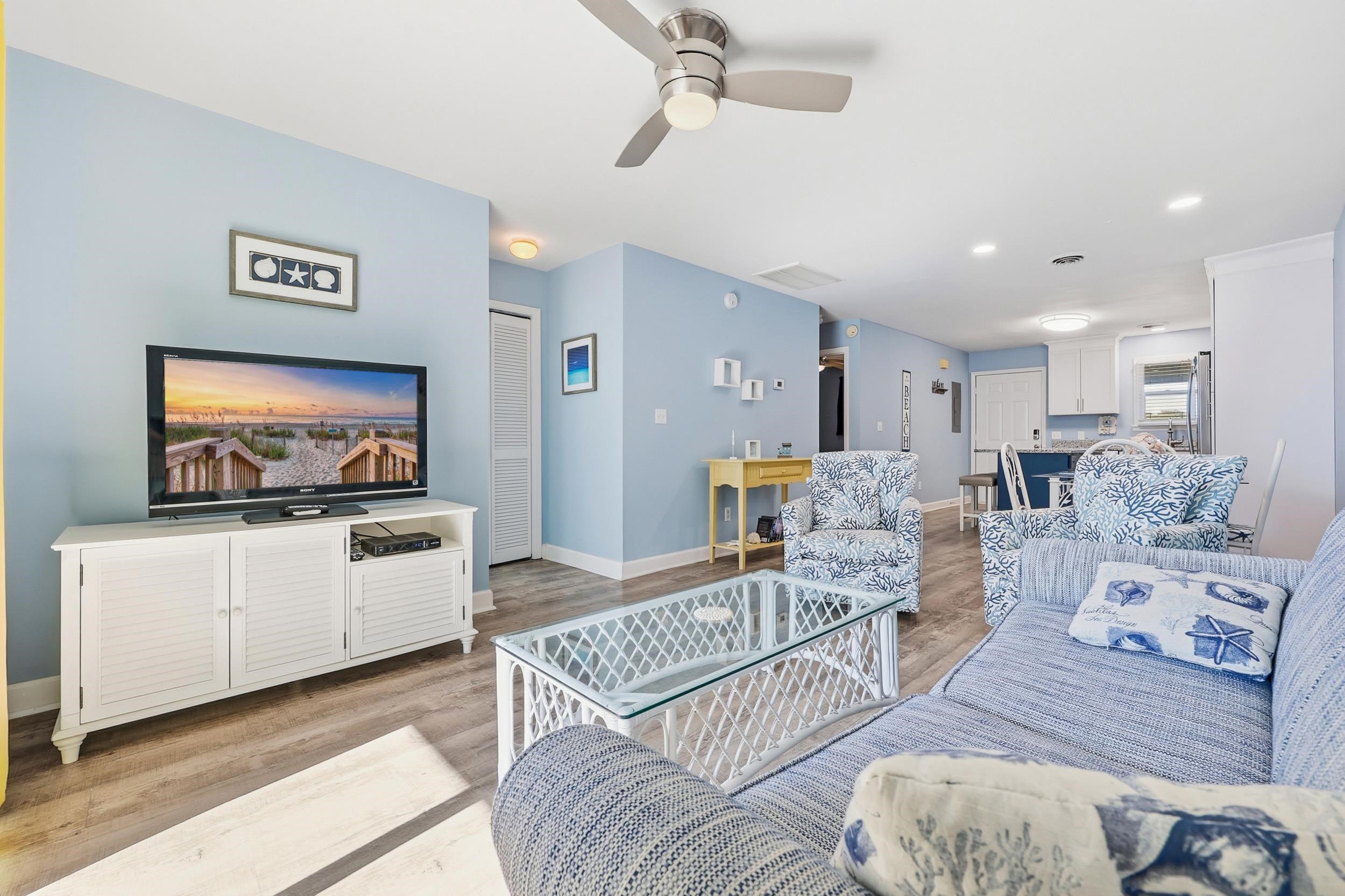 2001 Spring Street, Unit H2 North Myrtle Beach, SC 29582 - Photo 10 of 25 Living room featuring wood finished floors, ceiling fan, and recessed lighting