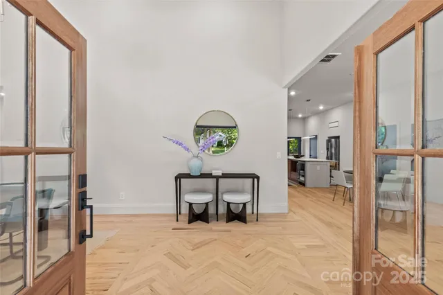 a view of a livingroom with furniture and windows