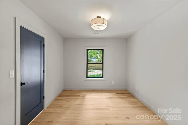 a bedroom with a bed and a walk in closet