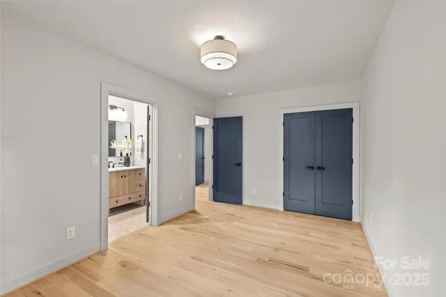 a view of a house with backyard and deck