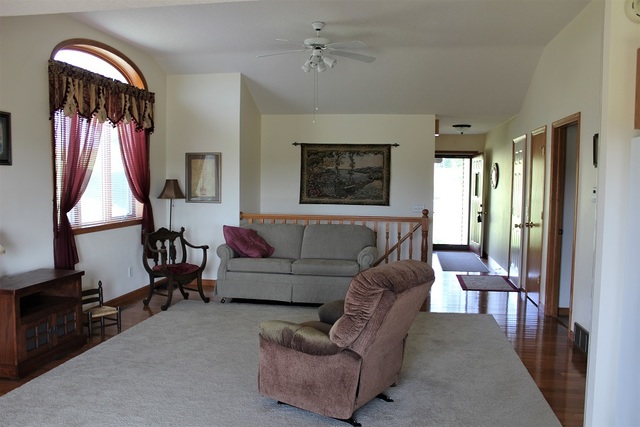 15539 Henry Road, Unit A Morrison, IL 61270 - Photo 5 of 32 a living room with furniture and a window