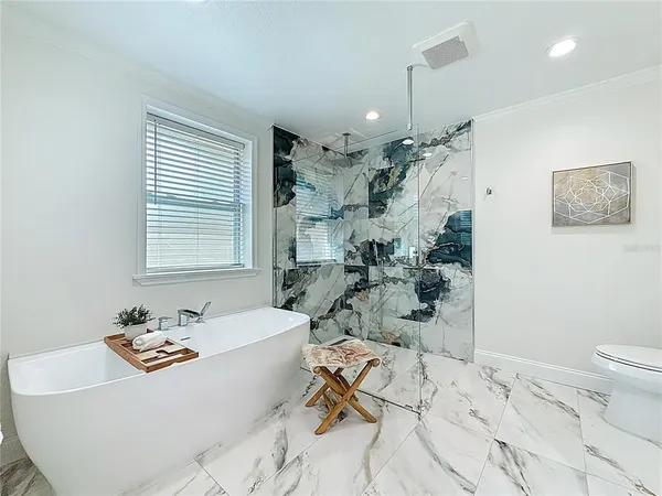a bathroom with a sink and a shower