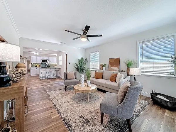 a living room with furniture and a window