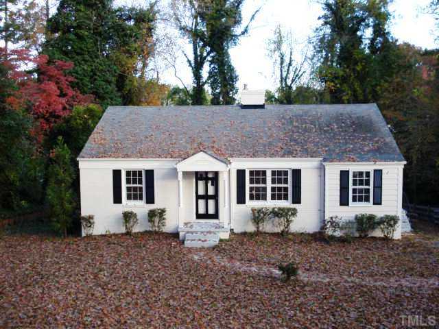 3038 Lewis Farm Road Raleigh, NC 27607 - Photo 1 of 12 a view of a house with a yard
