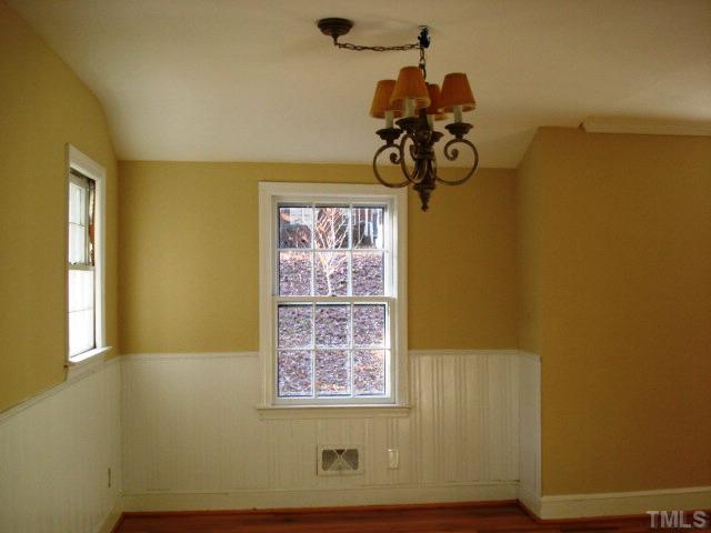 3038 Lewis Farm Road Raleigh, NC 27607 - Photo 5 of 12 a view of a door in the house