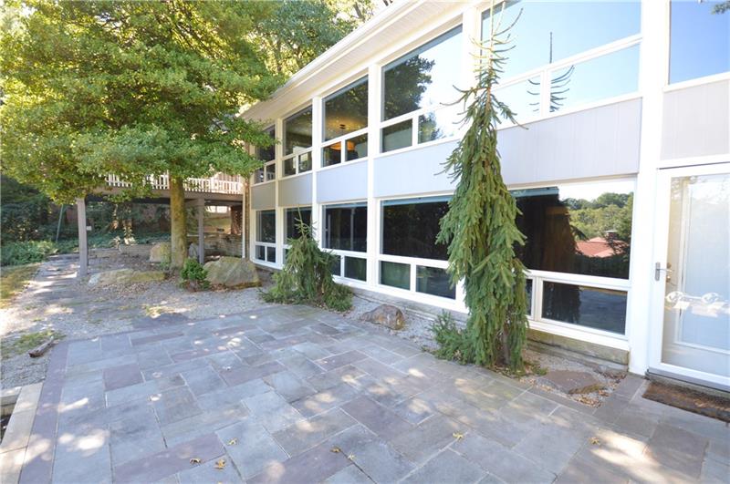 807 Valleyview Road Pittsburgh, PA 15243 - Photo 4 of 25 Wow! Flagstone walk way around home, composite deck to relax and enjoy the beautiful yard