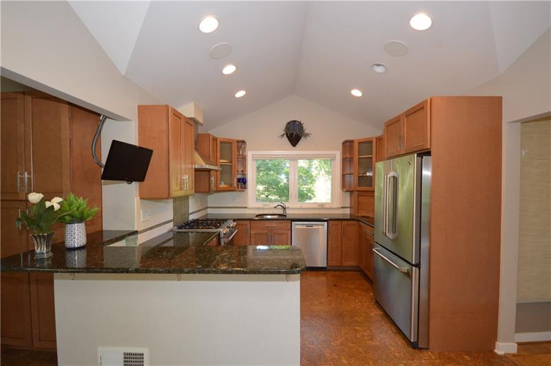 807 Valleyview Road Pittsburgh, PA 15243 - Photo 8 of 25 Diningroom is open to the Livingroom, Stone Fireplace and Wall of Windows!