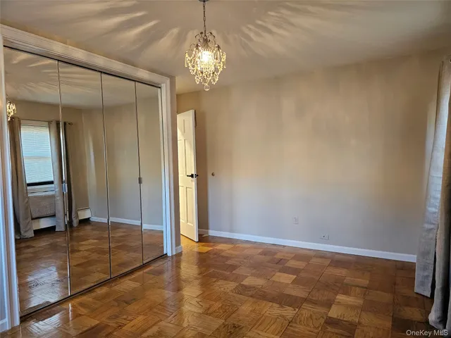 a bathroom with a sink a mirror and a shower