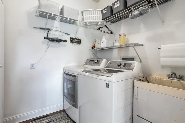 a utility room with dryer and washer