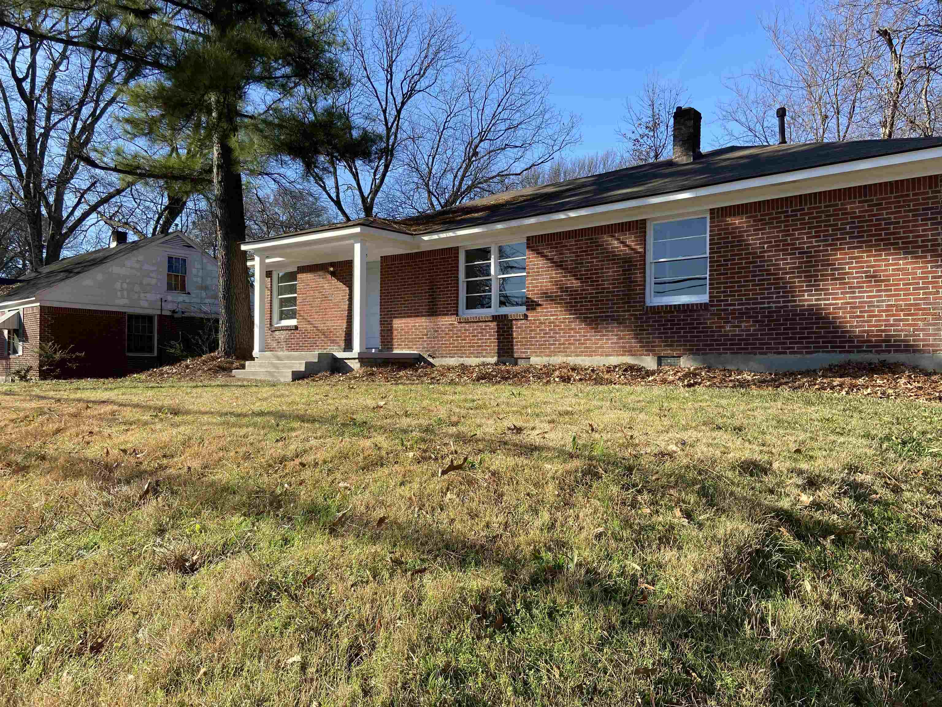 1395 Prescott Road Memphis, TN 38111 - Photo 2 of 18 a view of a house with a yard