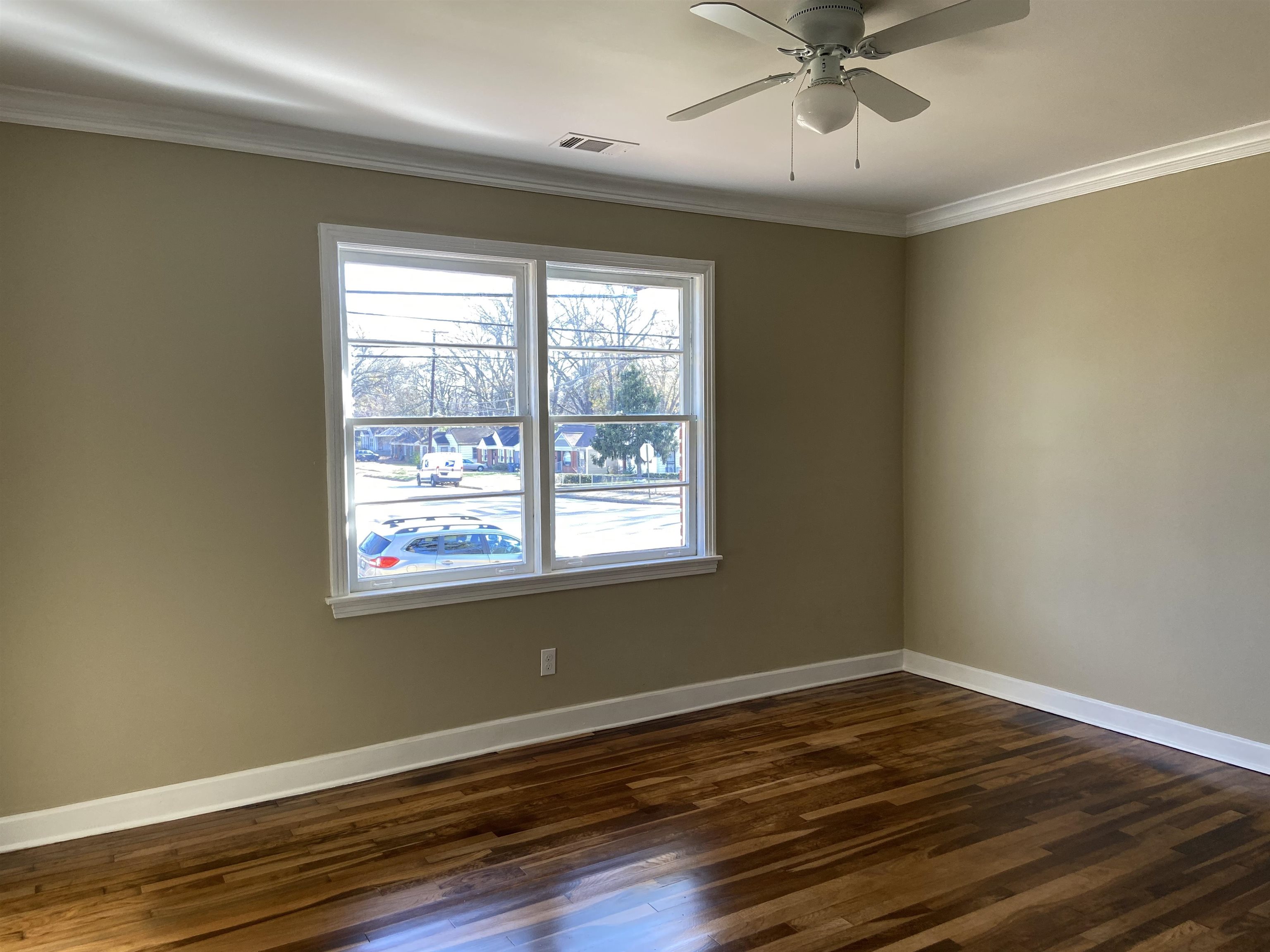 1395 Prescott Road Memphis, TN 38111 - Photo 13 of 18 a view of a room with wooden floor and windows