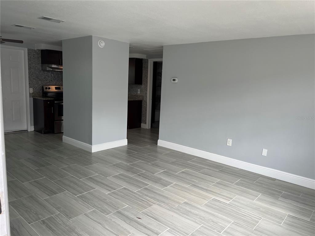 5333 Pasadena Drive, Unit 5333 New Port Richey, FL 34652 - Photo 4 of 12 a view of an empty room with closet and a window