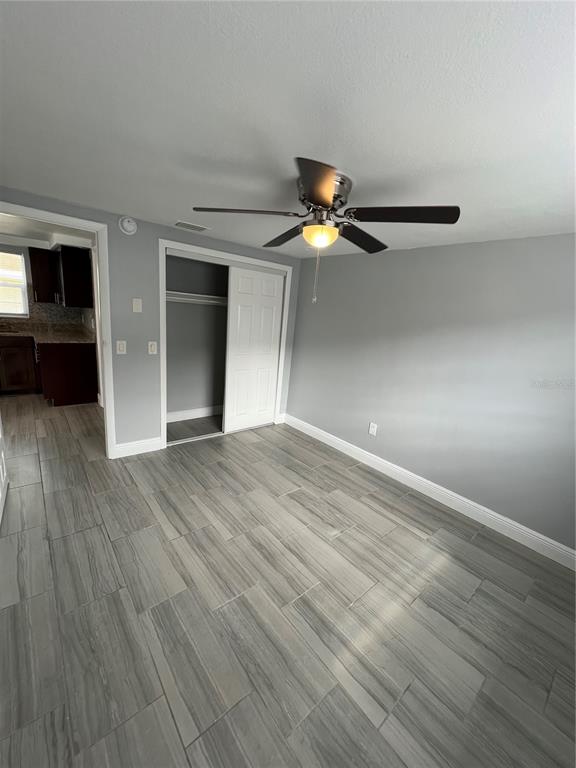 5333 Pasadena Drive, Unit 5333 New Port Richey, FL 34652 - Photo 7 of 12 a view of a livingroom with wooden floor