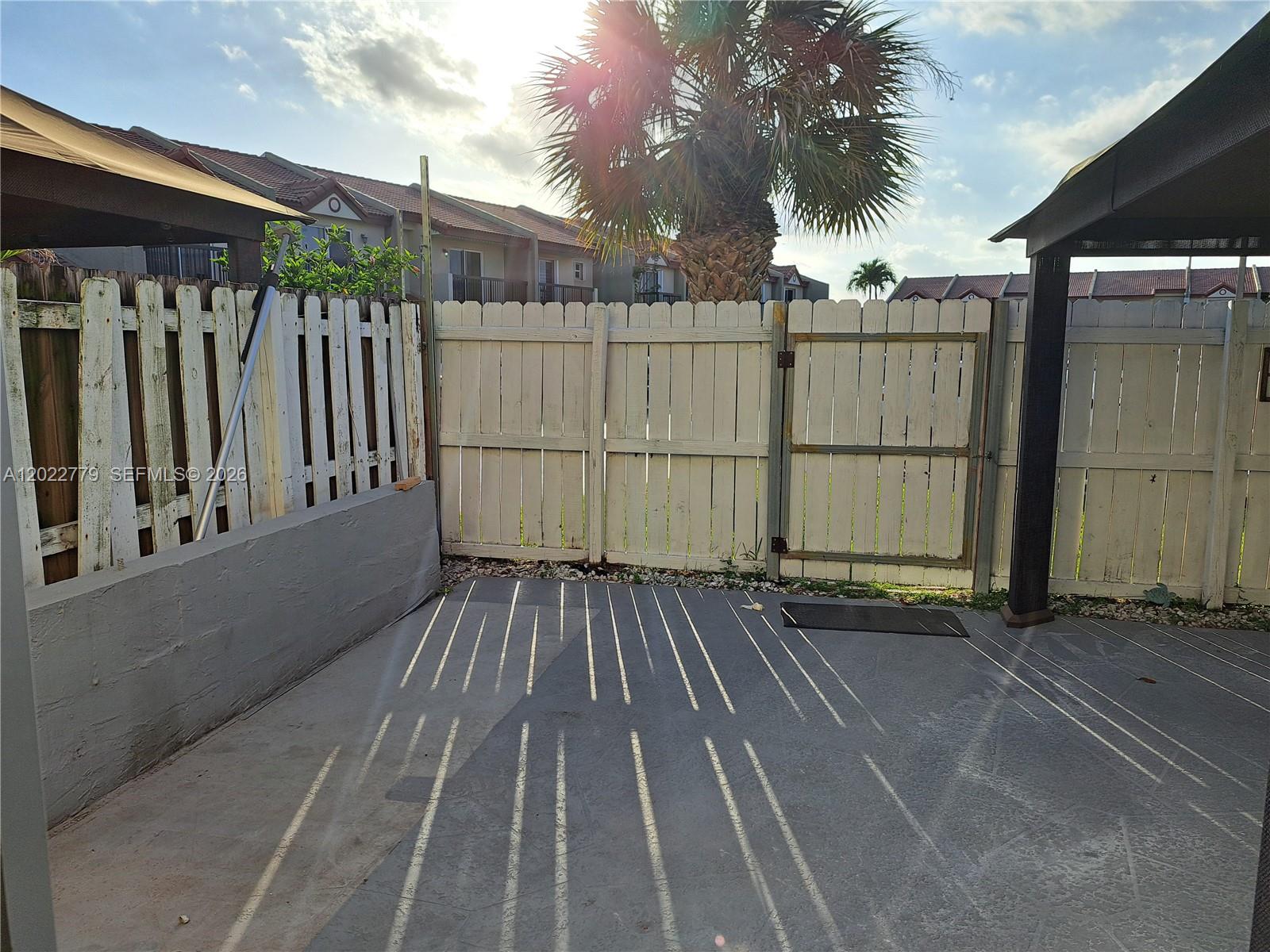 6140 Southwest 129th Place, Unit 2007 Miami, FL 33183 - Photo 21 of 21 Fence & Exit