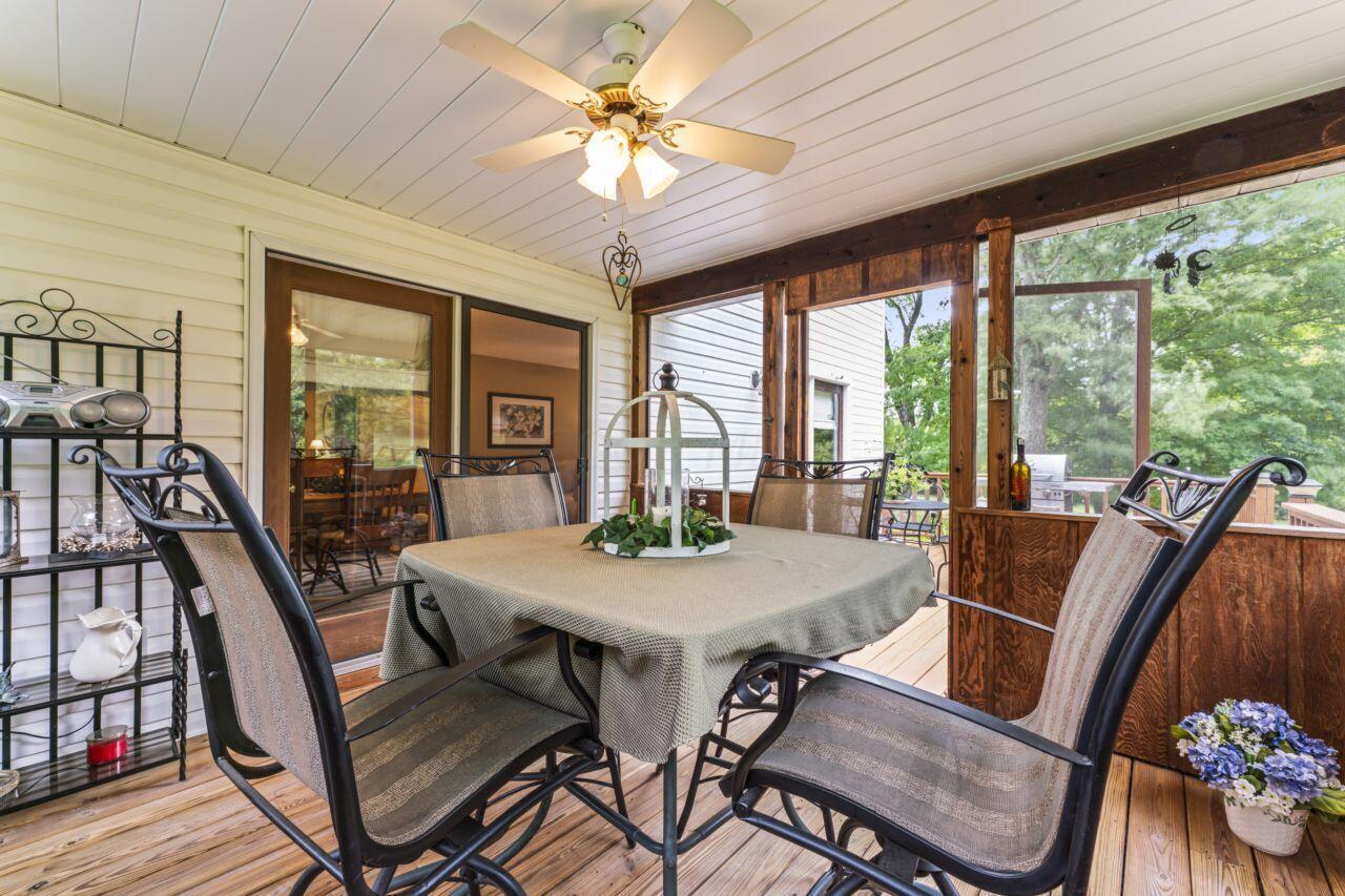 1550 Swans Road Northeast Newark, OH 43055 - Photo 22 of 65 Screened Porch to Patio