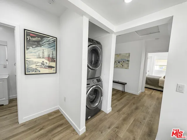 a view of a storage & utility room with washer and dryer