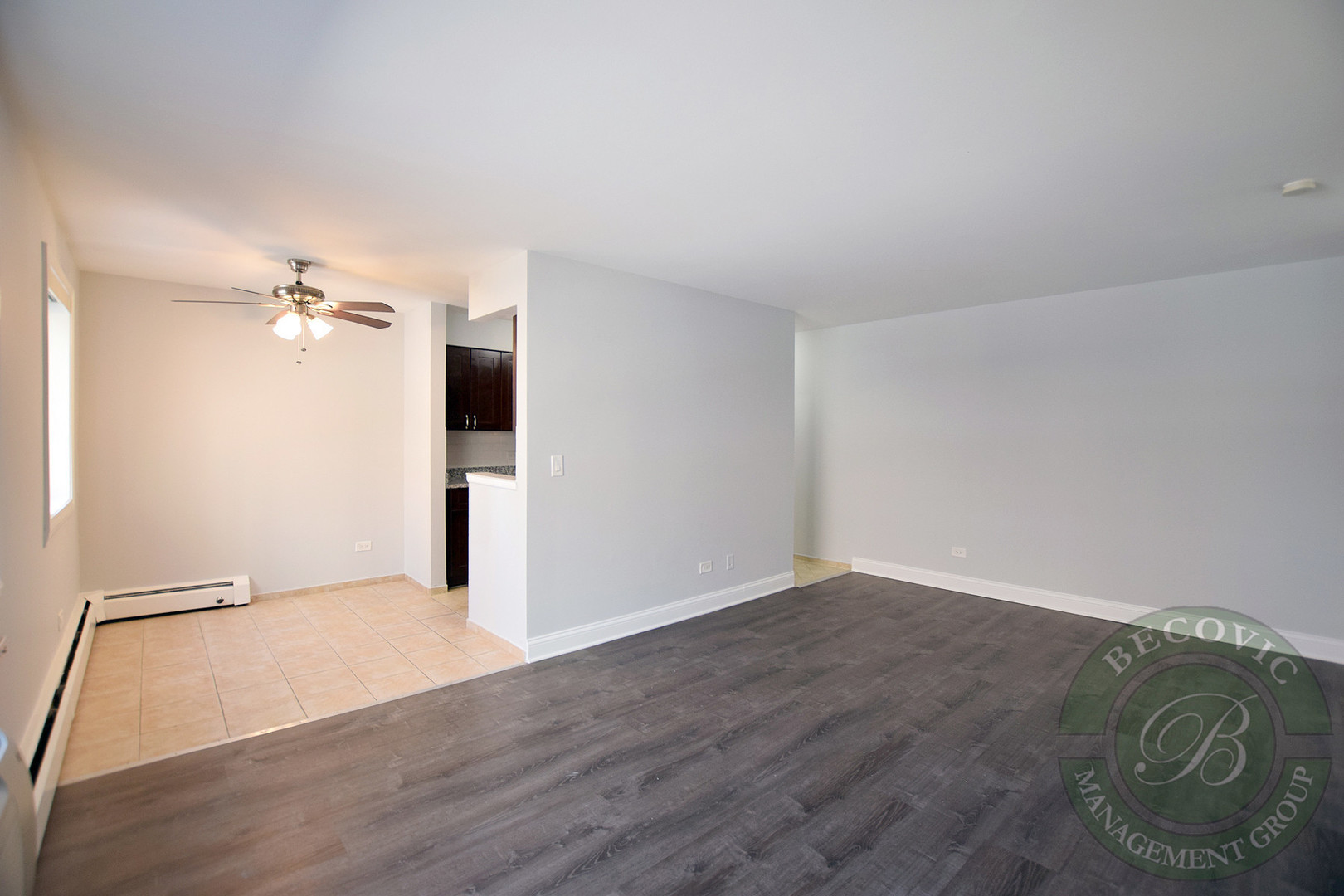 6001 North Kenmore Avenue, Unit 511 Chicago, IL 60660 - Photo 5 of 12 an empty room with wooden floor and closet