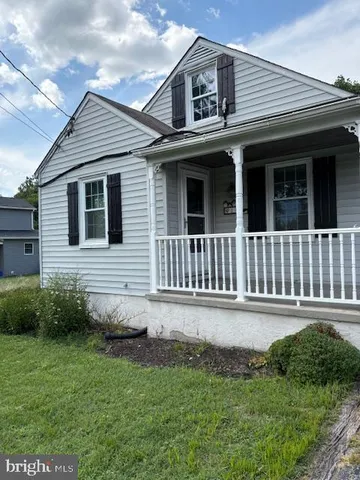 a front view of a house with yard
