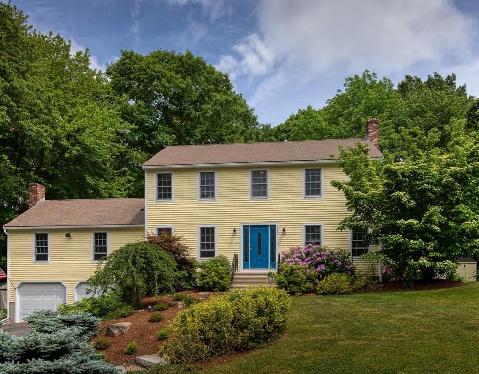 112 Upton Road Westborough, MA 01581 - Photo 1 of 41 a front view of a house with a garden