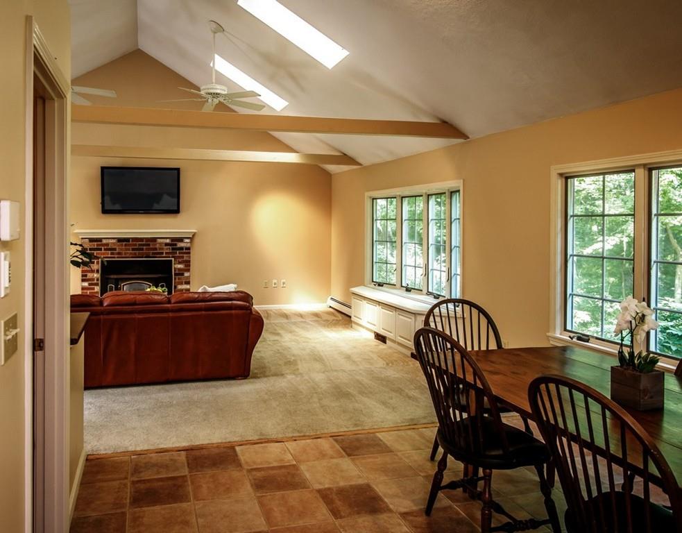 112 Upton Road Westborough, MA 01581 - Photo 11 of 41 a living room with furniture and a flat screen tv