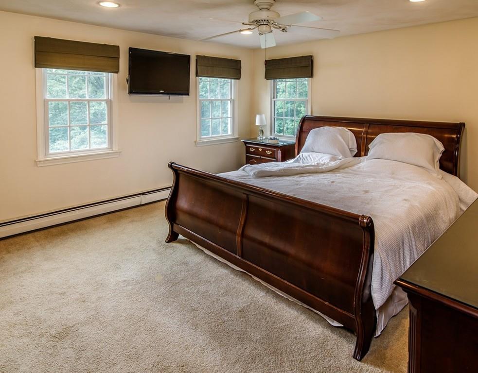 112 Upton Road Westborough, MA 01581 - Photo 22 of 41 a bedroom with a bed and a window