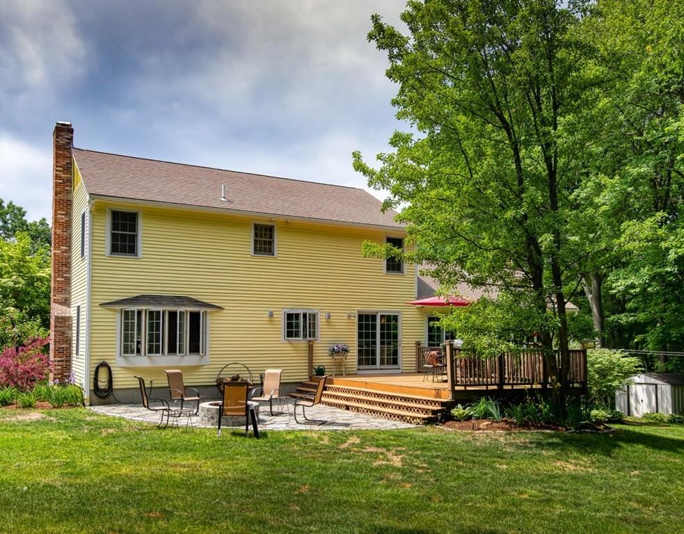 112 Upton Road Westborough, MA 01581 - Photo 35 of 41 front view of a house with a yard
