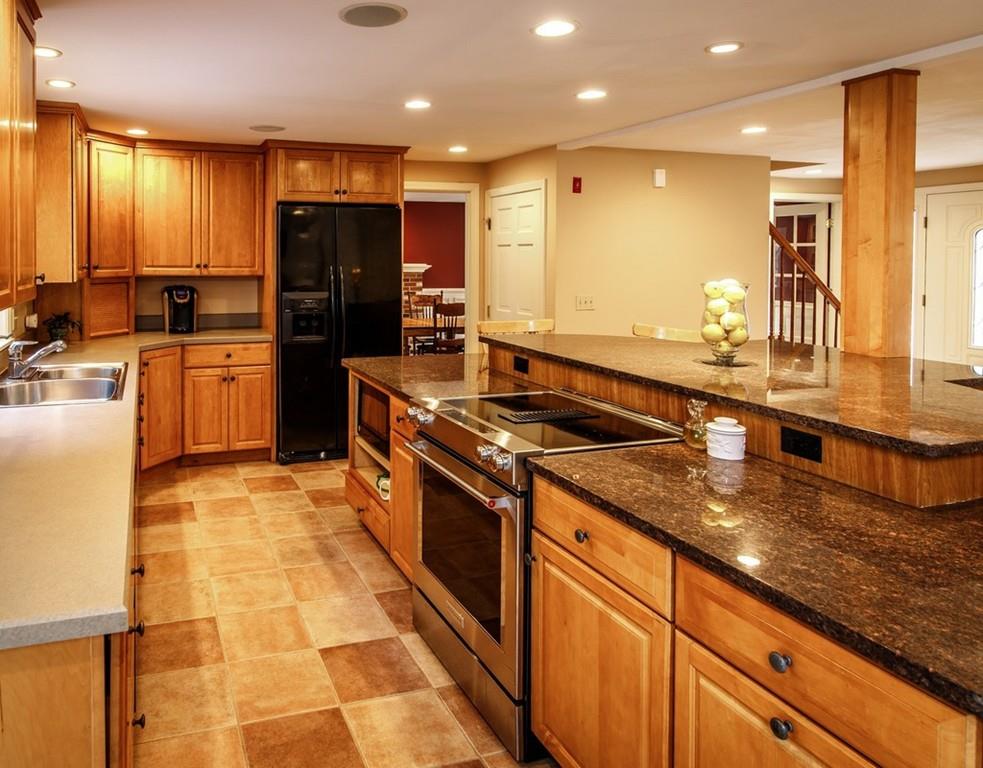 112 Upton Road Westborough, MA 01581 - Photo 4 of 41 a kitchen with stainless steel appliances granite countertop a sink a stove and a refrigerator