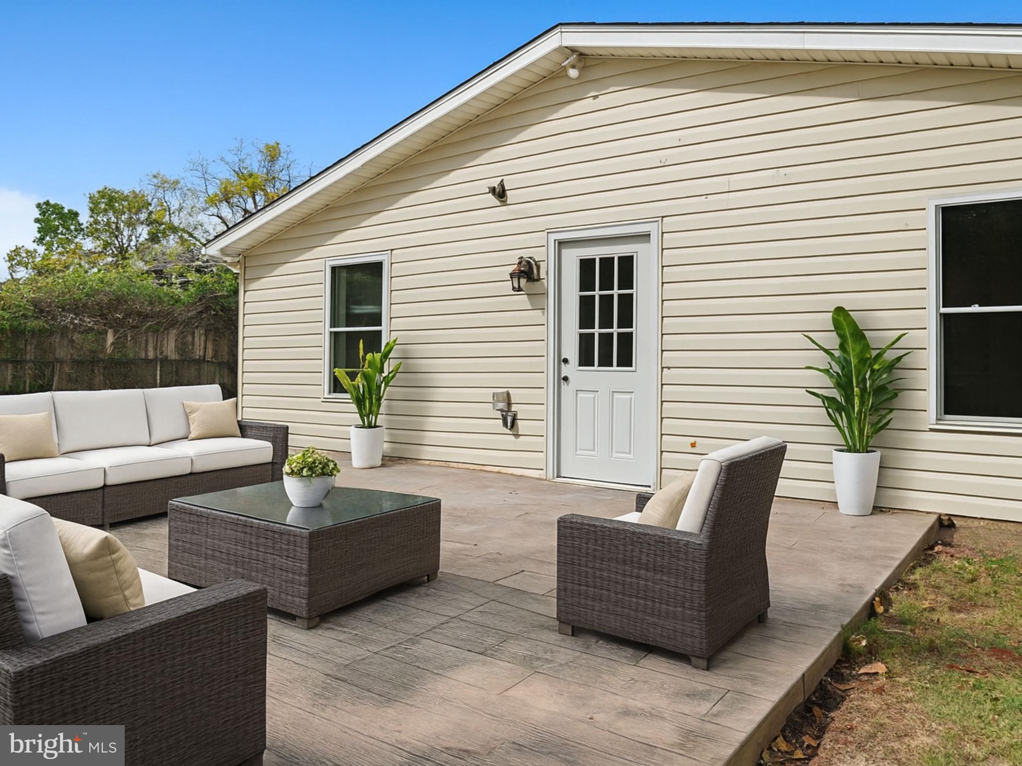 1002 South Buckingham Road Sterling, VA 20164 - Photo 5 of 18 a balcony with furniture and a potted plant