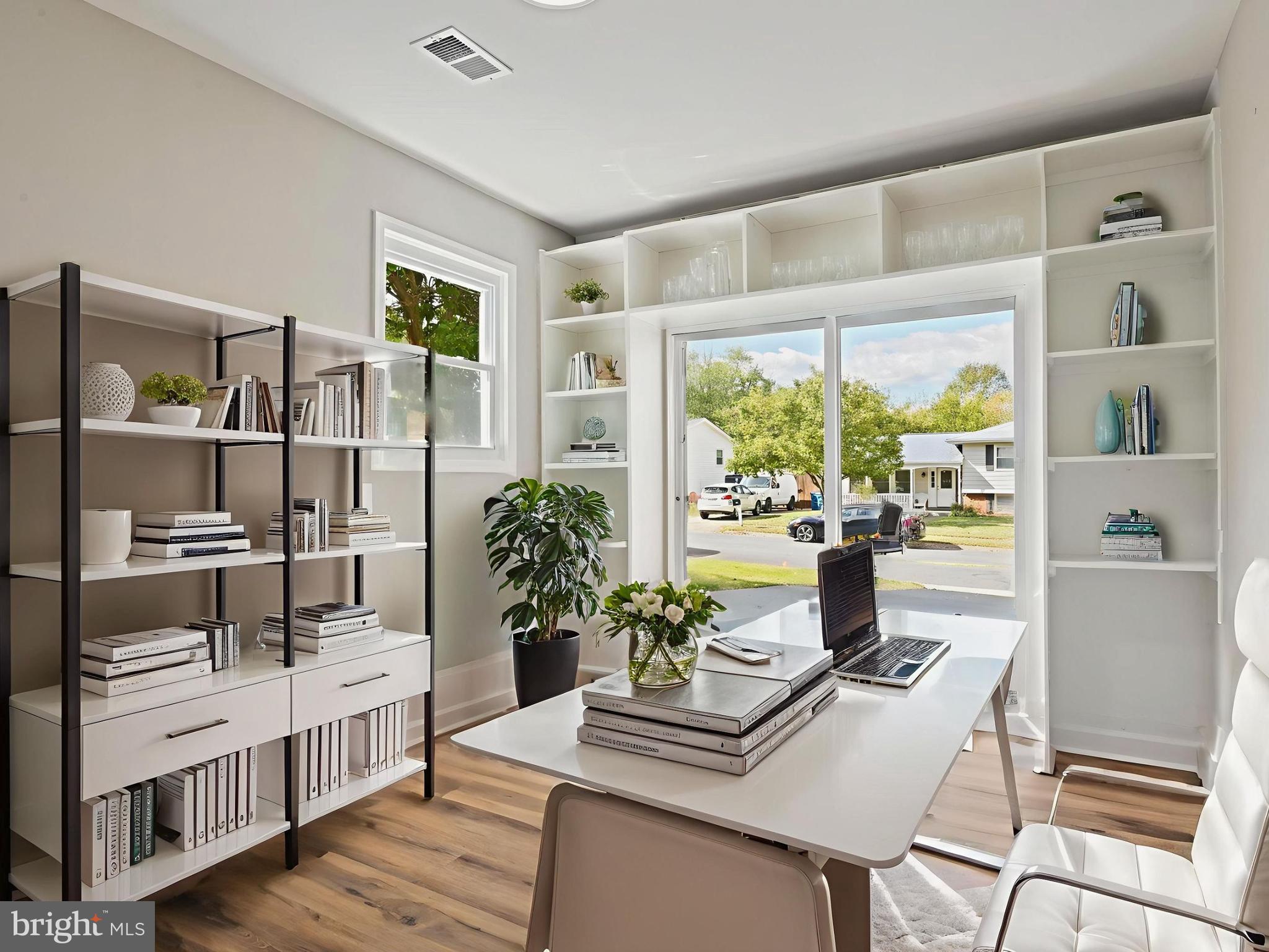 1002 South Buckingham Road Sterling, VA 20164 - Photo 8 of 18 a living room with furniture and a large window