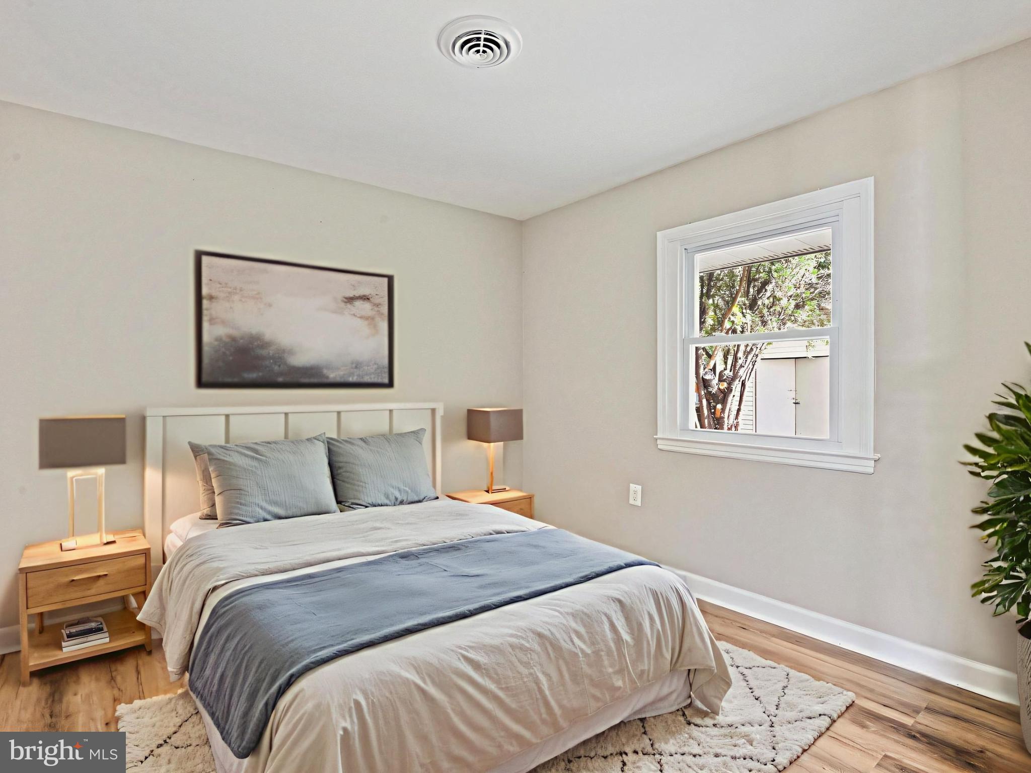 1002 South Buckingham Road Sterling, VA 20164 - Photo 9 of 18 a bedroom with a bed and a window