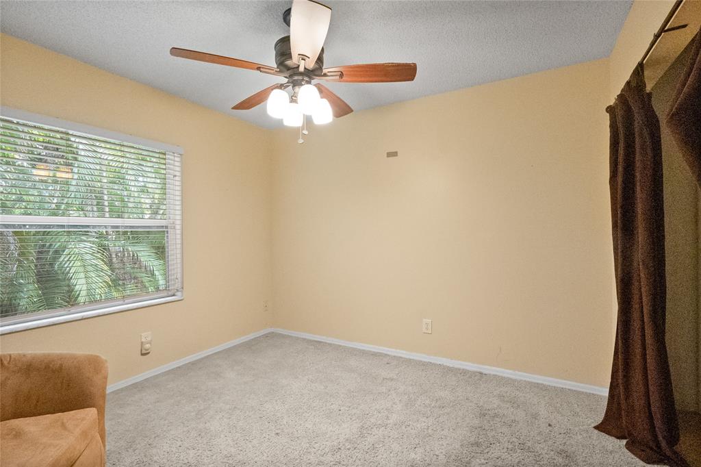 12626 Southwest 9th Place Davie, FL 33325 - Photo 12 of 26 an empty room with a window