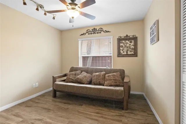 a living room with furniture and a window