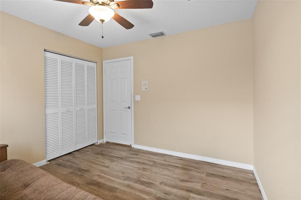 12626 Southwest 9th Place Davie, FL 33325 - Photo 16 of 26 wooden floor in an empty room