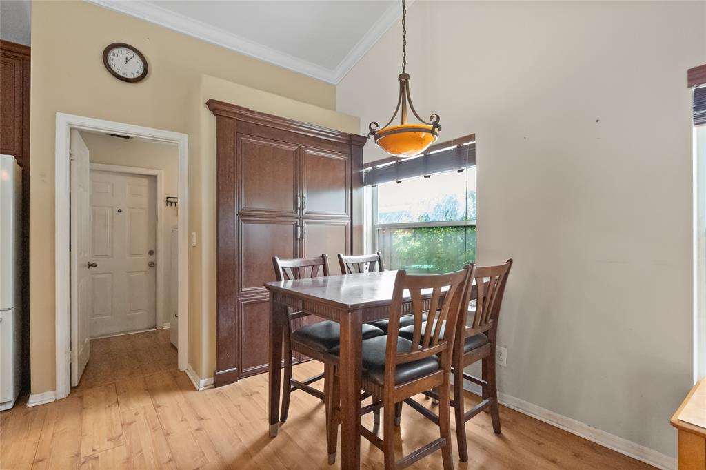 12626 Southwest 9th Place Davie, FL 33325 - Photo 5 of 26 a view of a dining room with furniture window and wooden floor