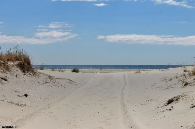 a view of beach and lake