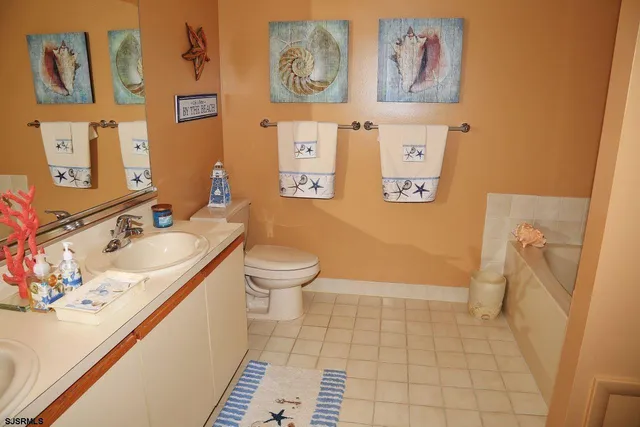 a bathroom with a sink and toilet