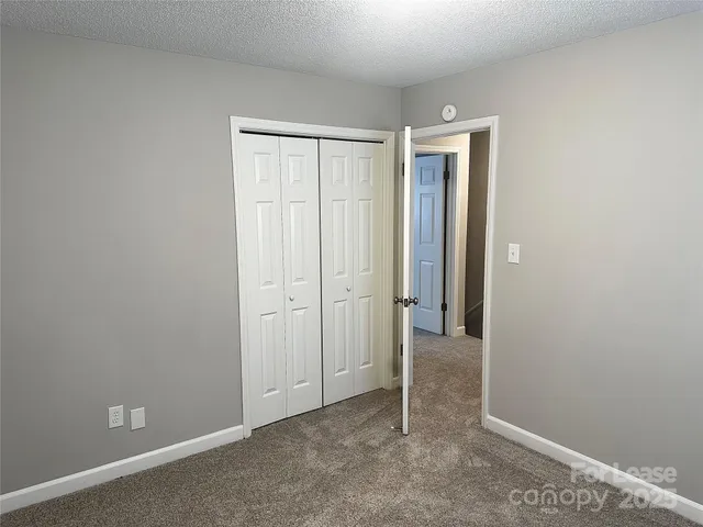 an empty room with closet