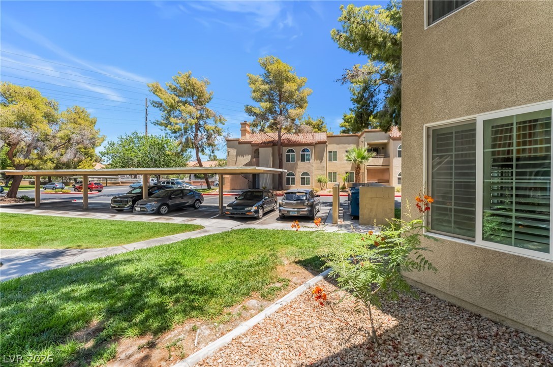 3145 East Flamingo Road, Unit 1092 Las Vegas, NV 89121 - Photo 31 of 33 Covered parking offers convenience for residents in this multi-unit community.