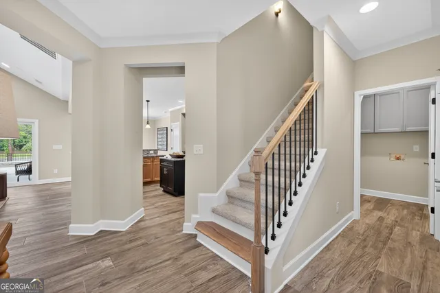 a view of cabinets and wooden floor