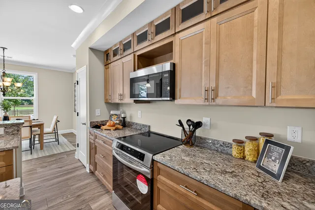 a bedroom with a large bed and a large window