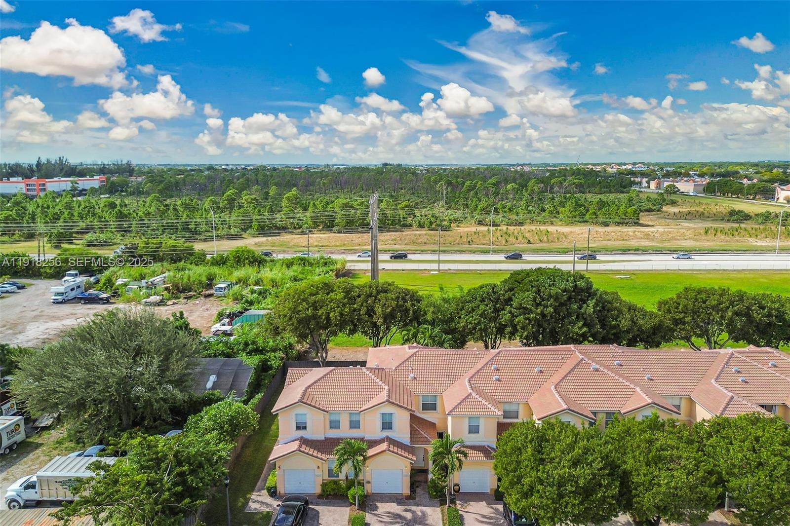 12566 Southwest 126th Avenue Miami, FL 33186 - Photo 12 of 59 a view of a garden with an outdoor space