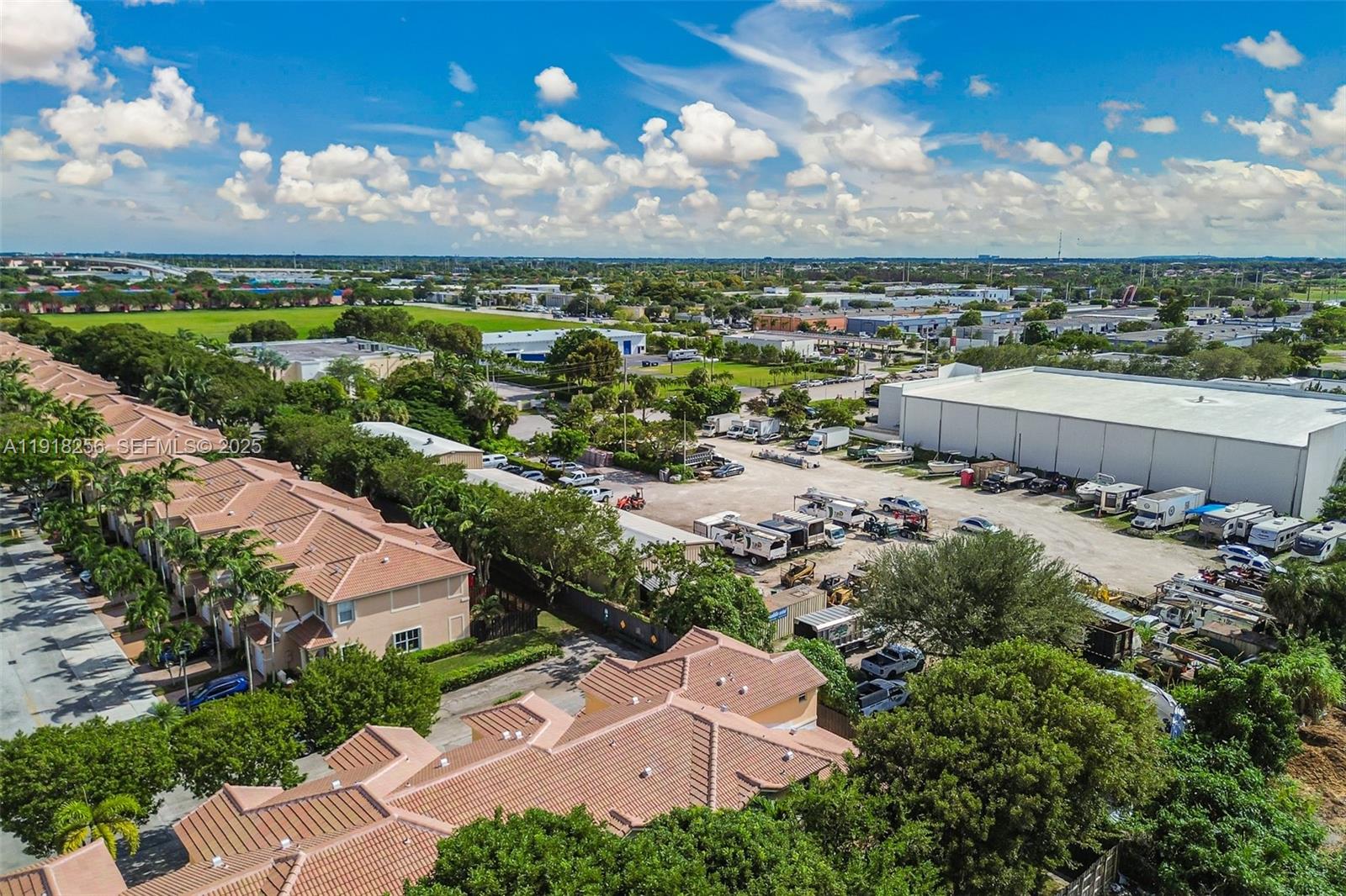 12566 Southwest 126th Avenue Miami, FL 33186 - Photo 16 of 59 an aerial view of a house with a yard