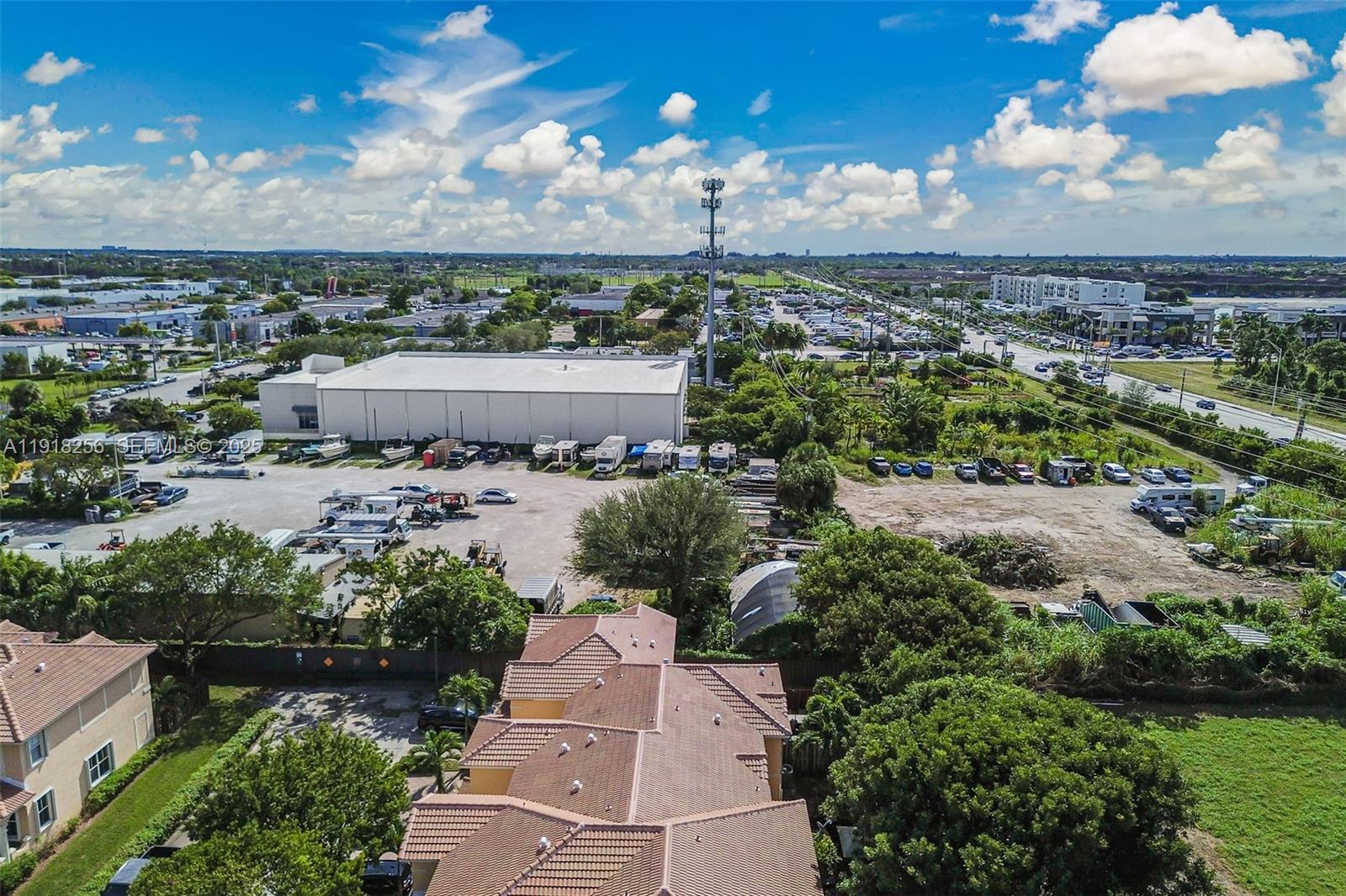 12566 Southwest 126th Avenue Miami, FL 33186 - Photo 17 of 59 an aerial view of a house with a yard