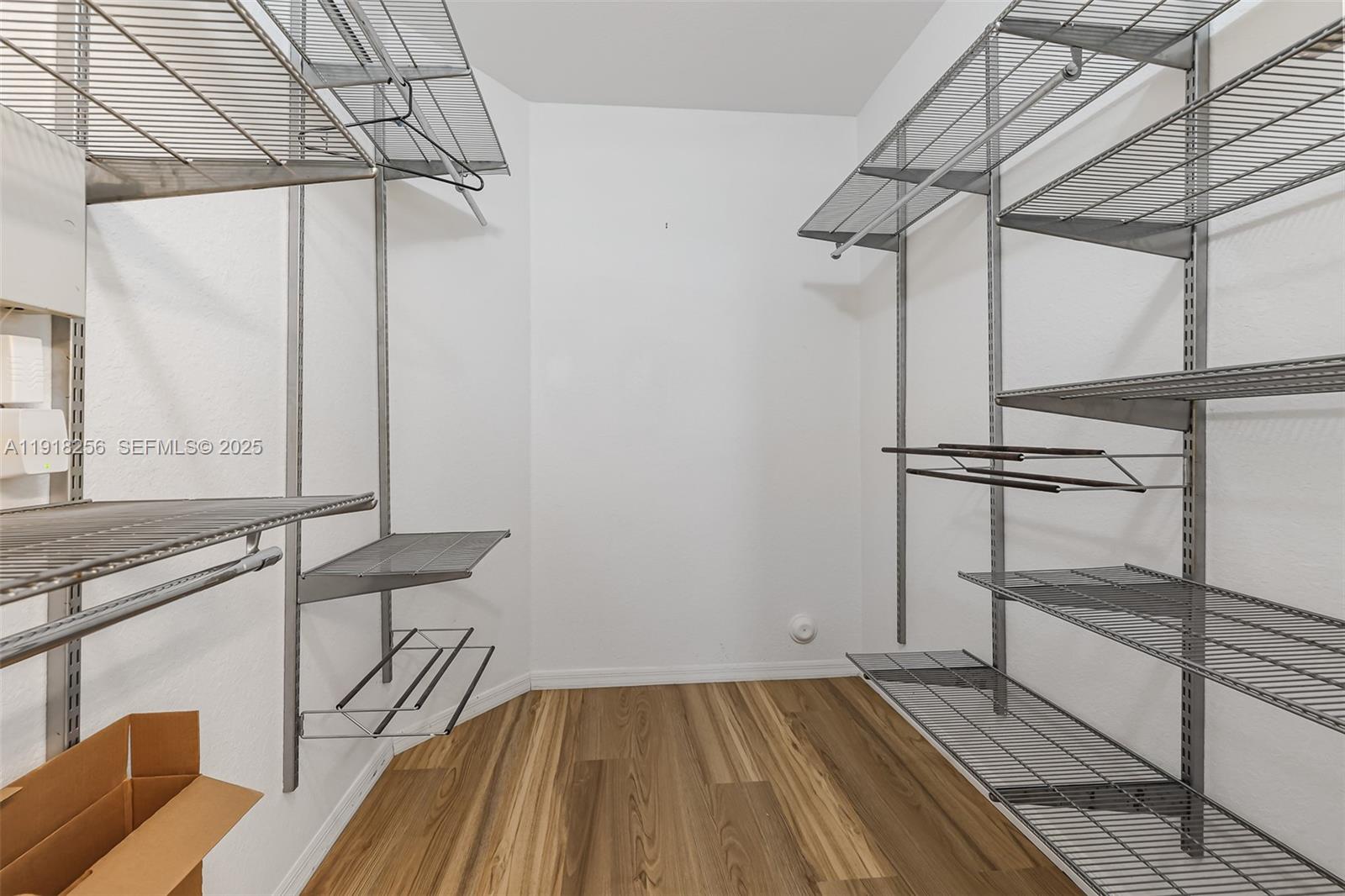 12566 Southwest 126th Avenue Miami, FL 33186 - Photo 39 of 59 a view of a room with racks on the wall