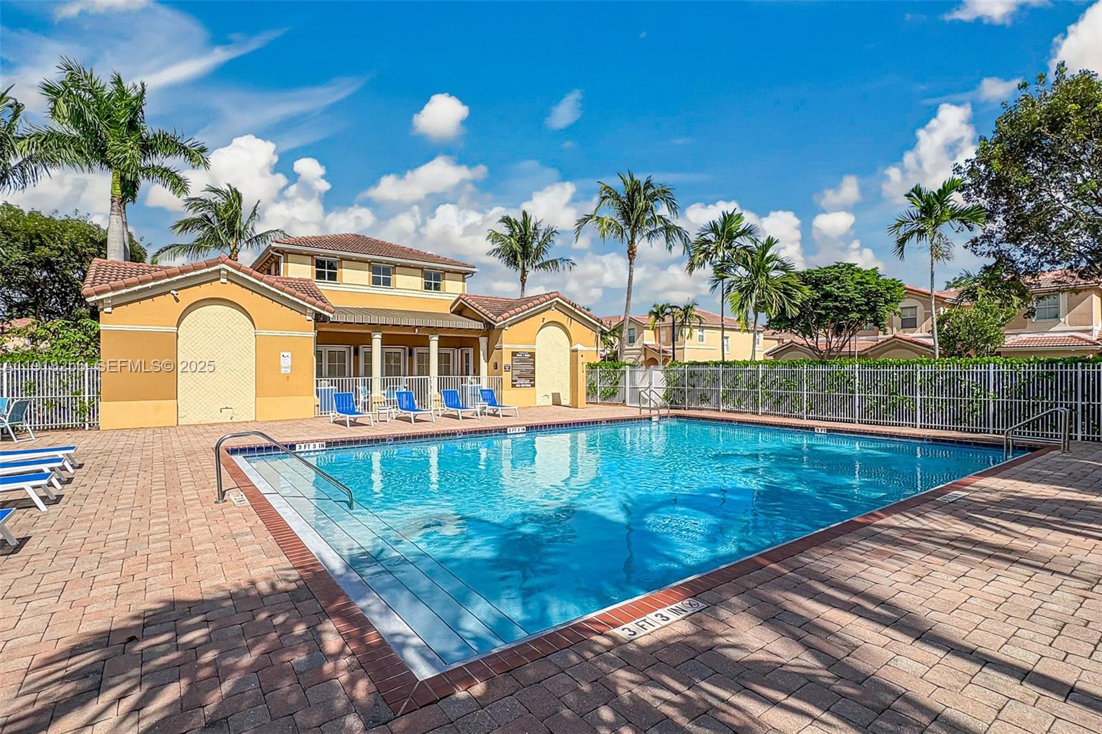 12566 Southwest 126th Avenue Miami, FL 33186 - Photo 57 of 59 swimming pool view with sitting space