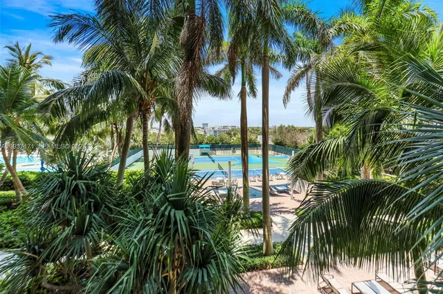 a utility room with sink dryer and washer