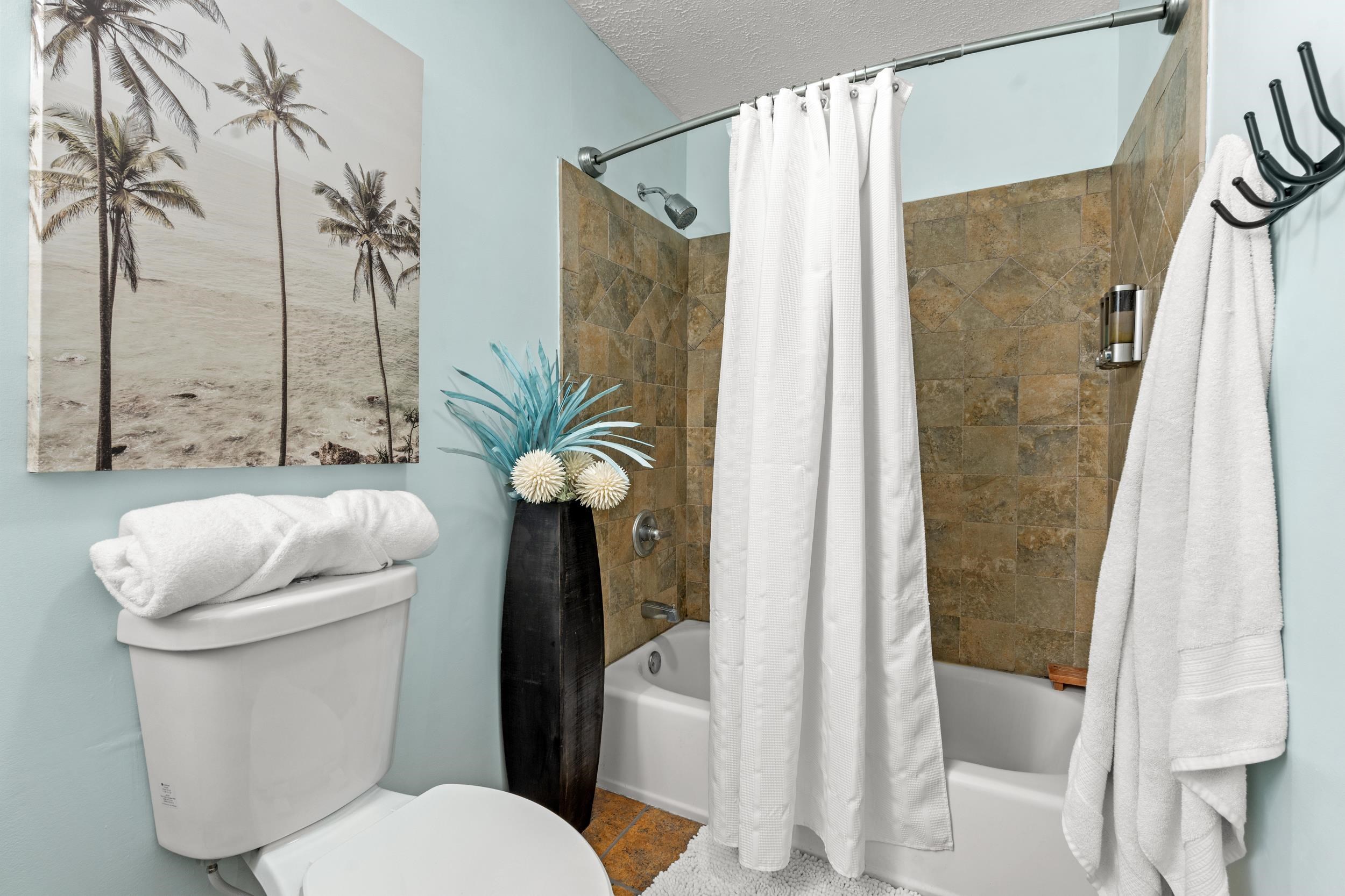 208 Bethea Street Latta, SC 29565 - Photo 16 of 36 Bathroom with shower / bath combo and a textured ceiling