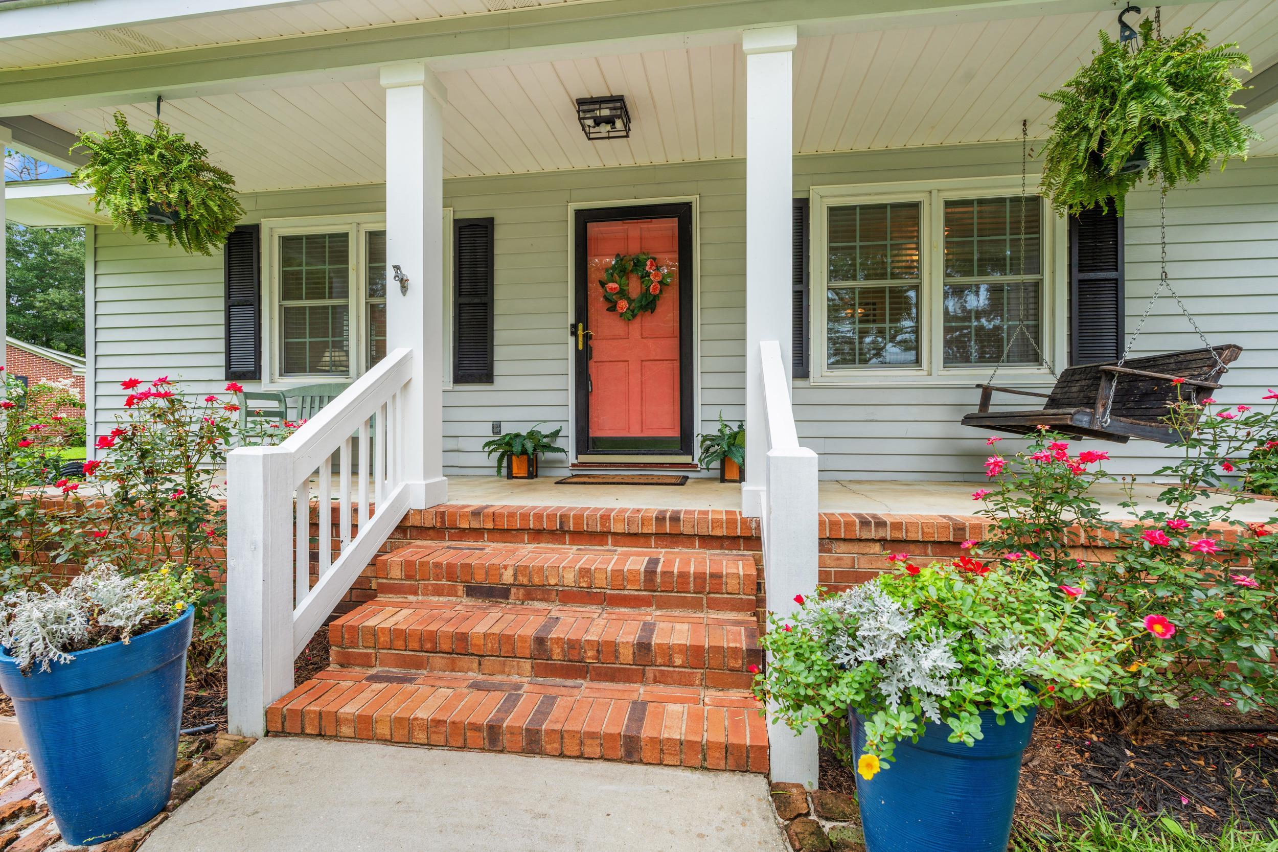 208 Bethea Street Latta, SC 29565 - Photo 2 of 36 Doorway to property featuring covered porch
