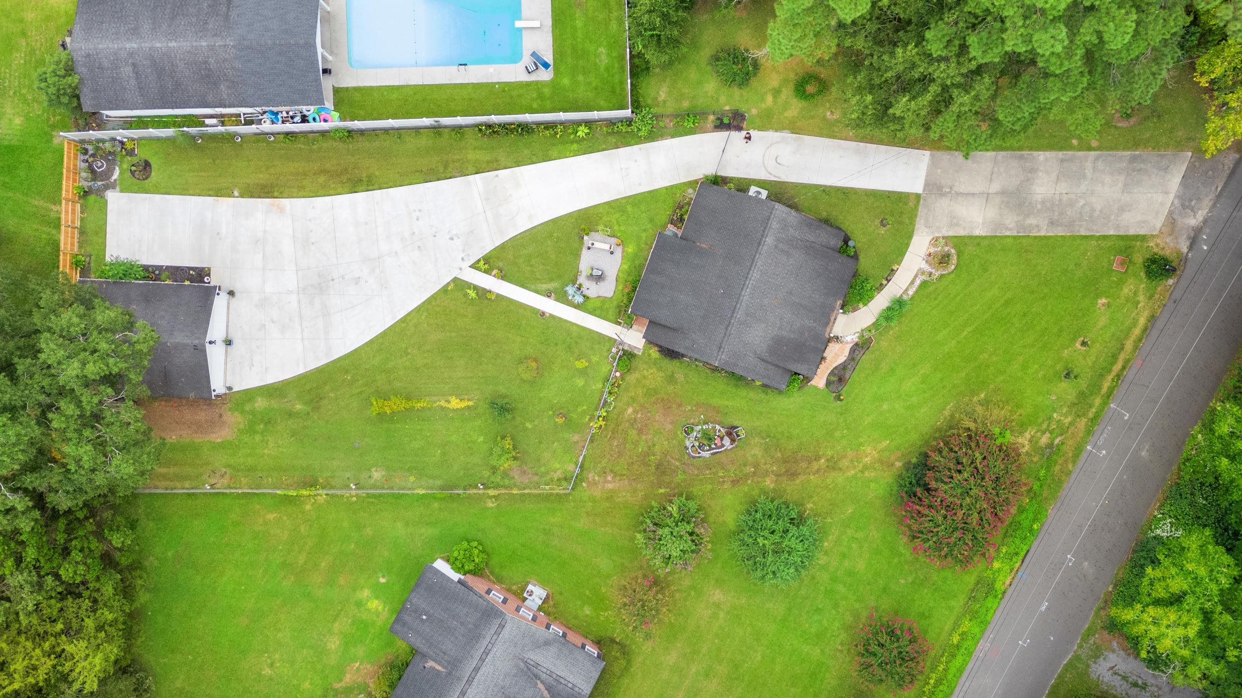 208 Bethea Street Latta, SC 29565 - Photo 28 of 36 Aerial view of a pool area